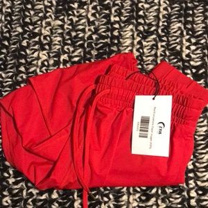 Red Everywhere zipper joggers